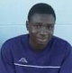 John Manga is pictured here at 12 years old soon after he came to the United States from Africa. The audio above is from an interview with Paula Hollis, ... - 1380206882842