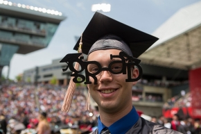 Student wears grad glasses