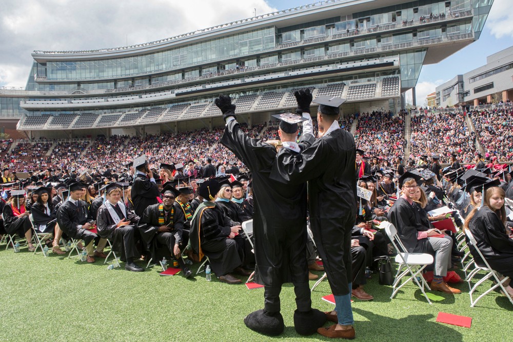 A student mortarboard decorated that reads Next Stop: Law School.