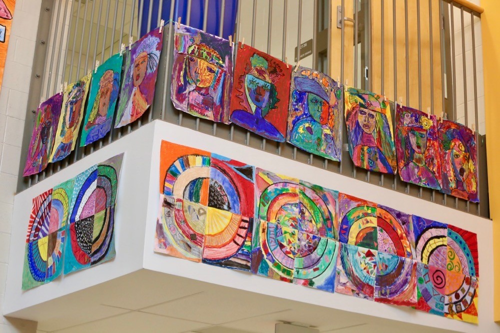 Colorful art adorns the walls of Cincinnati's Woodford Paideia Academy, school for arts education.