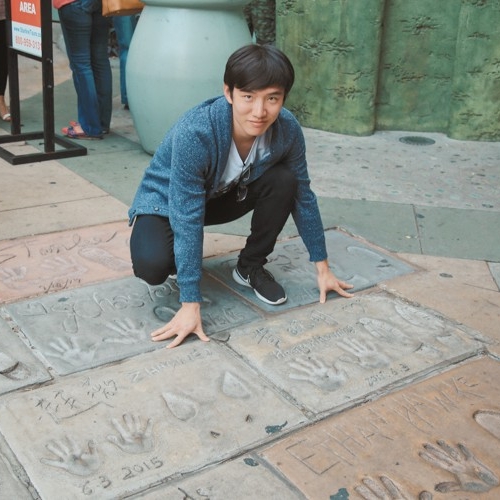 Visiting Hollywood's Walk of Fame featuring Chinese movie stars Huang Xiaoming and Zhao Wei.  