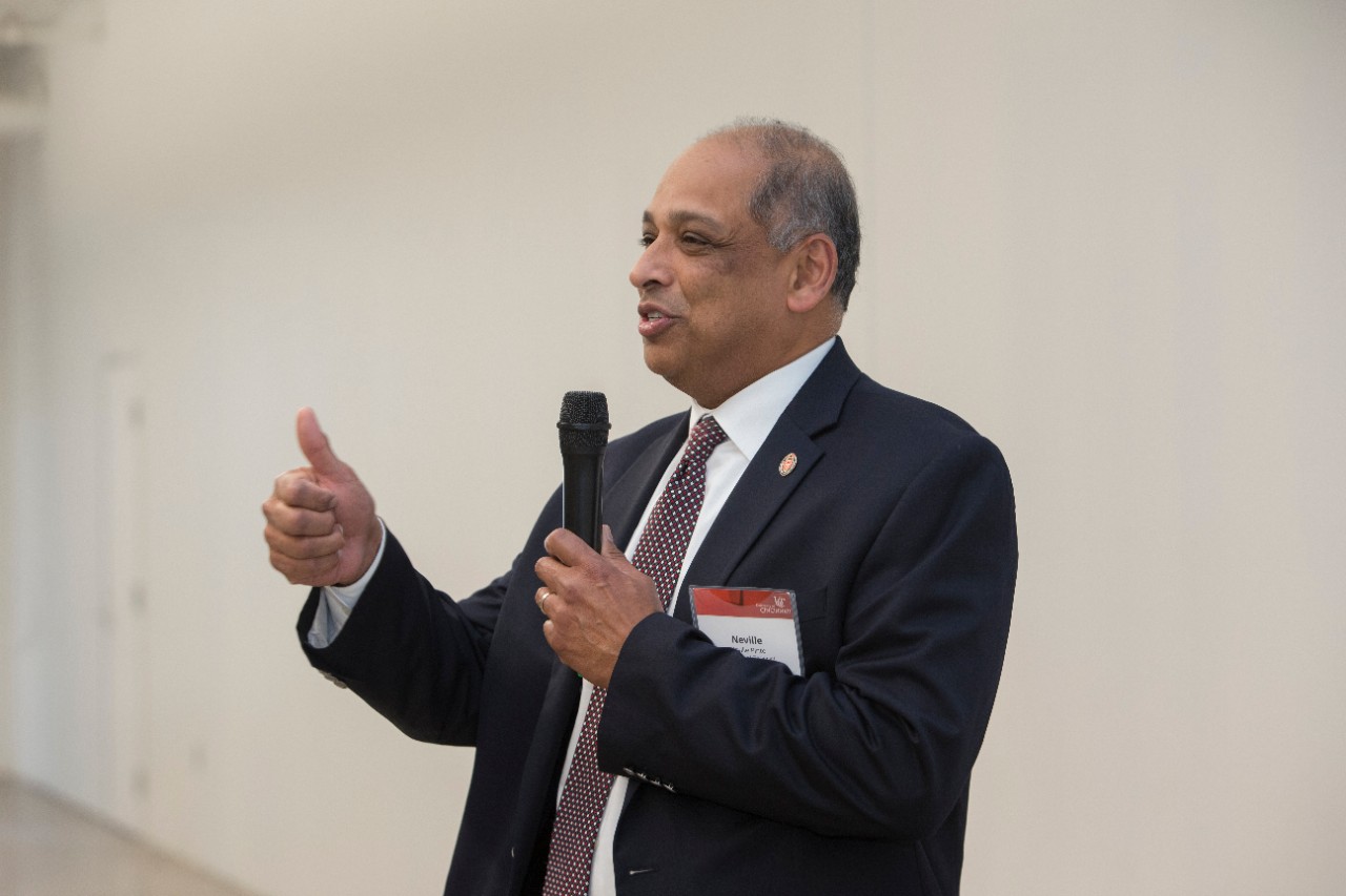 UC President Neville Pinto gives remarks ahead of the ribbon cutting ceremony. 