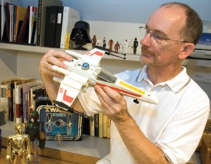 Jim Swearingen with an X-Wing Fighter