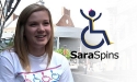 Sara 'Spins' in a wheelchair