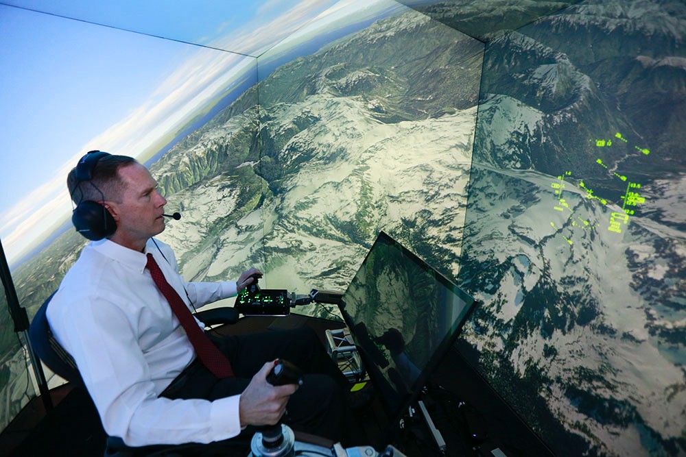 Ret. U.S. Air Force Col. Gene Lee pilots a fighter plane in a virtual combat simulation against enemies controlled by an artificial intelligence called Alpha at the Wright-Patterson Air Force Base. UC researchers and the developer of this system, Psibernetix, Inc., used a similar kind of artificial intelligence to predict treatment outcomes for patients with bipolar disorder. (Lisa Ventre/UC Creative Services) Ret. U.S. Air Force Col. Gene Lee pilots a fighter plane in a virtual combat simulation against enemies controlled by an artificial intelligence called Alpha at the Wright-Patterson Air Force Base. The developer of that system, Psibernetix, Inc., is working with UC researchers to diagnose and treat bipolar disorder. (Lisa Ventre/UC Creative Services)
