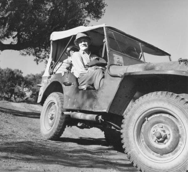 Carl Blegen in a land rover on safari.
