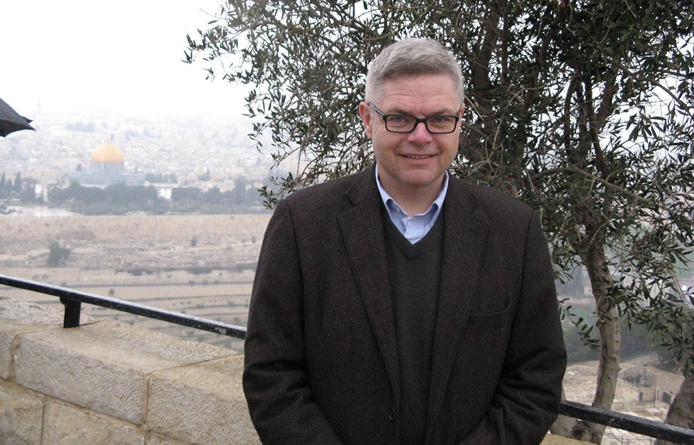 David Caudill stands at an overlook in Jerusalem