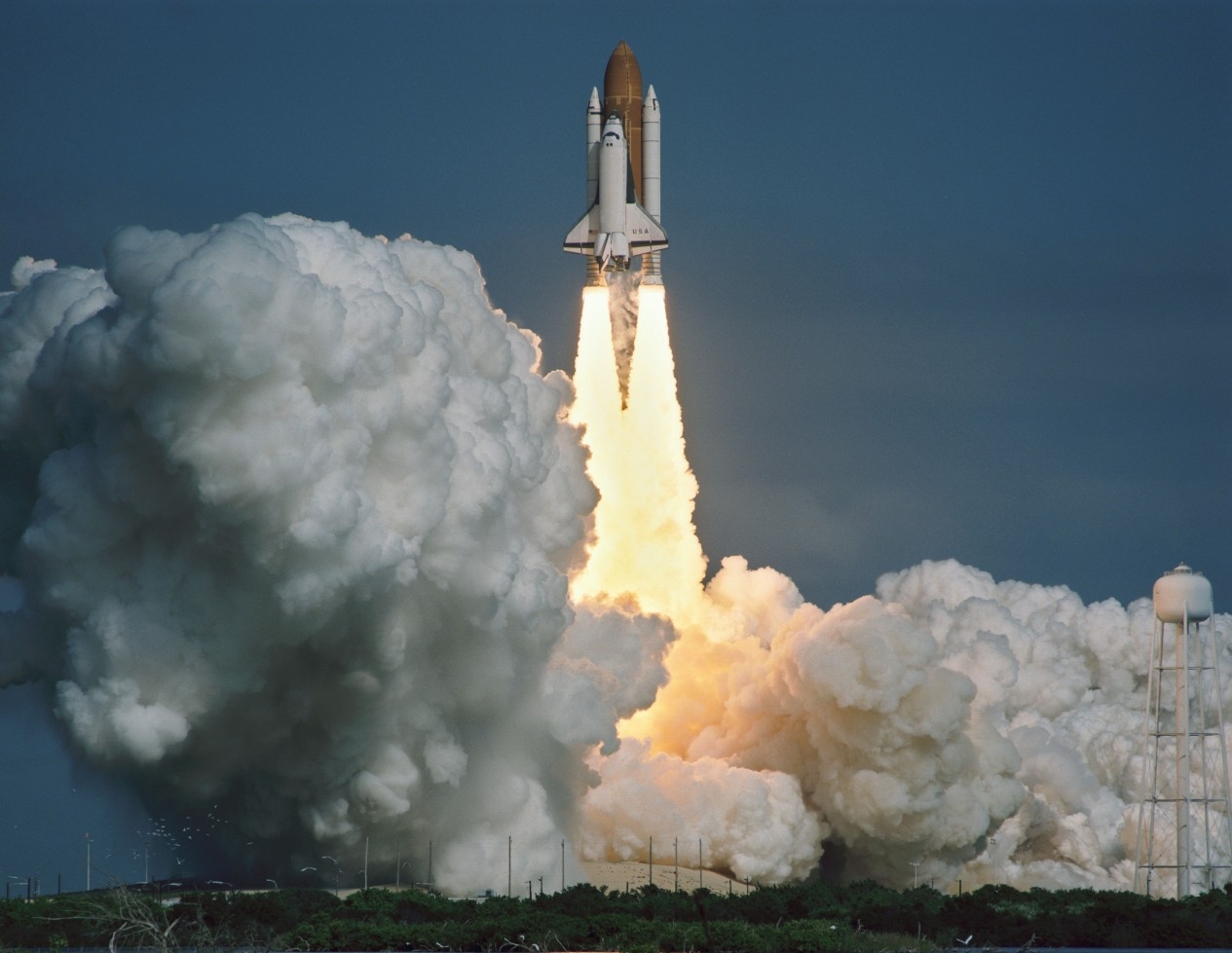 The space shuttle Columbia lifts off from Kennedy Space Center in this 1993 NASA file photo. The crew of Columbia, including Indian astronaut Kalpana Chawla, were killed when the space shuttle broke up on re-entry during a 2003 mission. It was Columbia's 28th mission. (NASA)