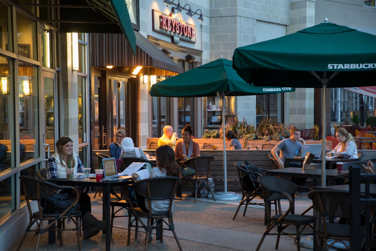 Students enjoy coffee at USquare Starbucks