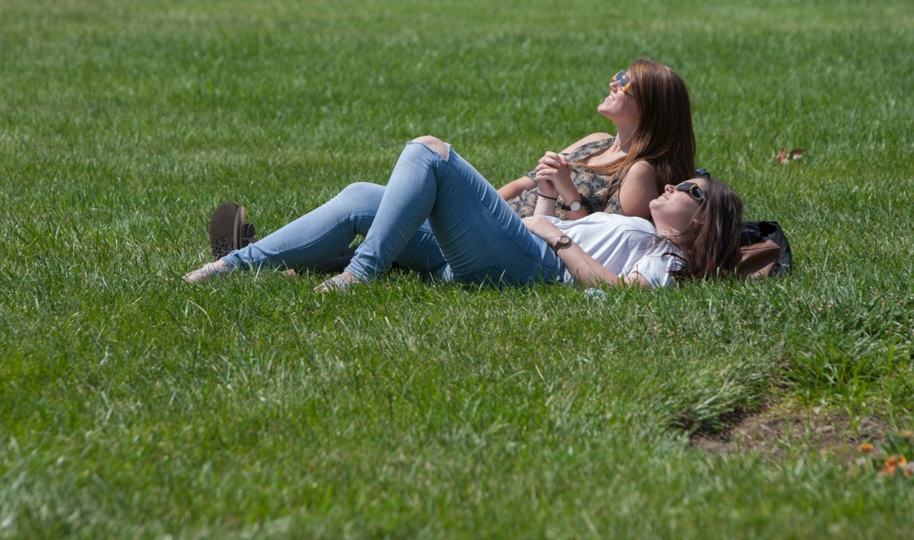 students observe solar eclipse