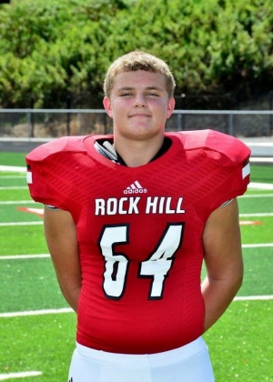 T.J. McGinnis poses in his Rock Hill High School football uniform.