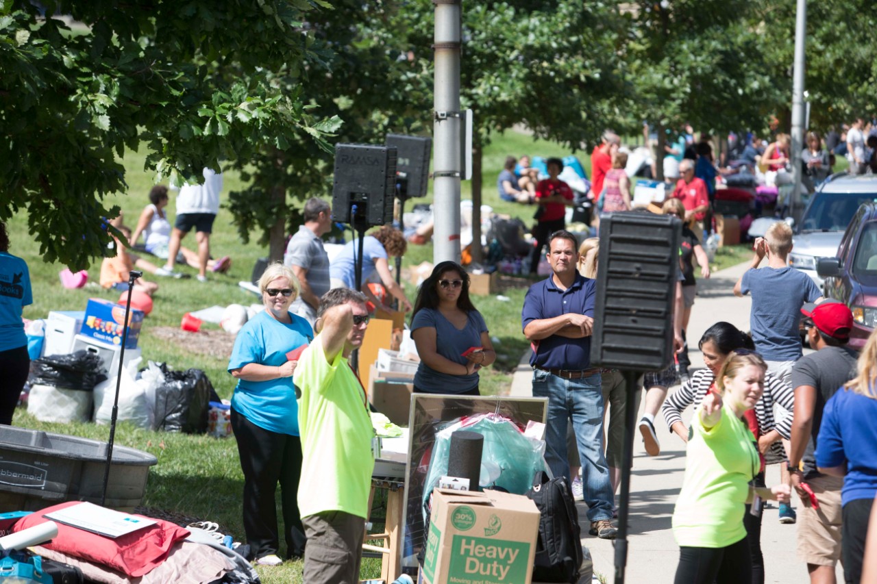 Families line up with students as they move into dorms.