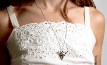 American bison pendant worn by model 