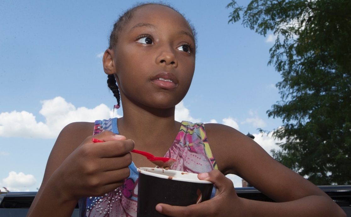 Joli enjoys her ice cream at Washington Park.