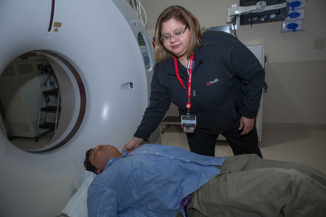 CT technician Jessica Rivera demonstrates a CAT scan at UC Health's West Chester Hospital. 