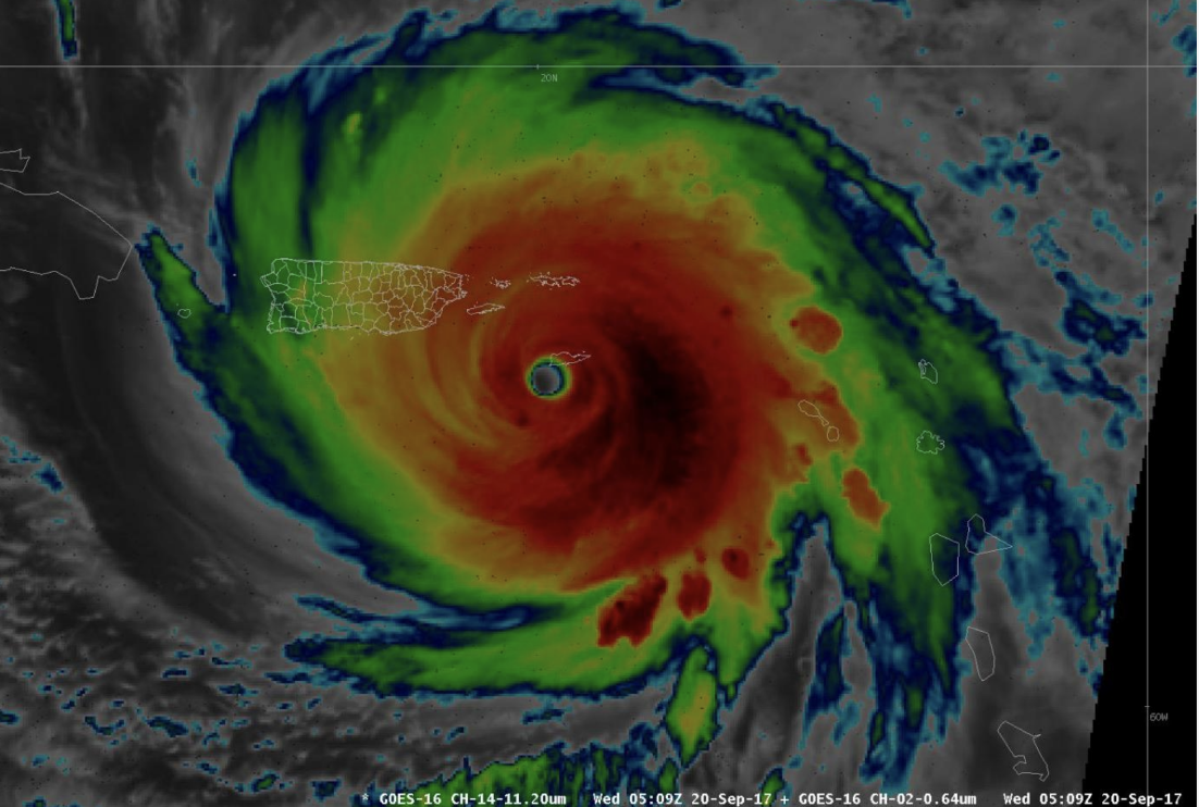 A satellite image shows Hurricane Maria bearing down on Puerto Rico (outlined) and packing 155 mph winds. The storm was many times bigger than the island. (National Weather Service.)