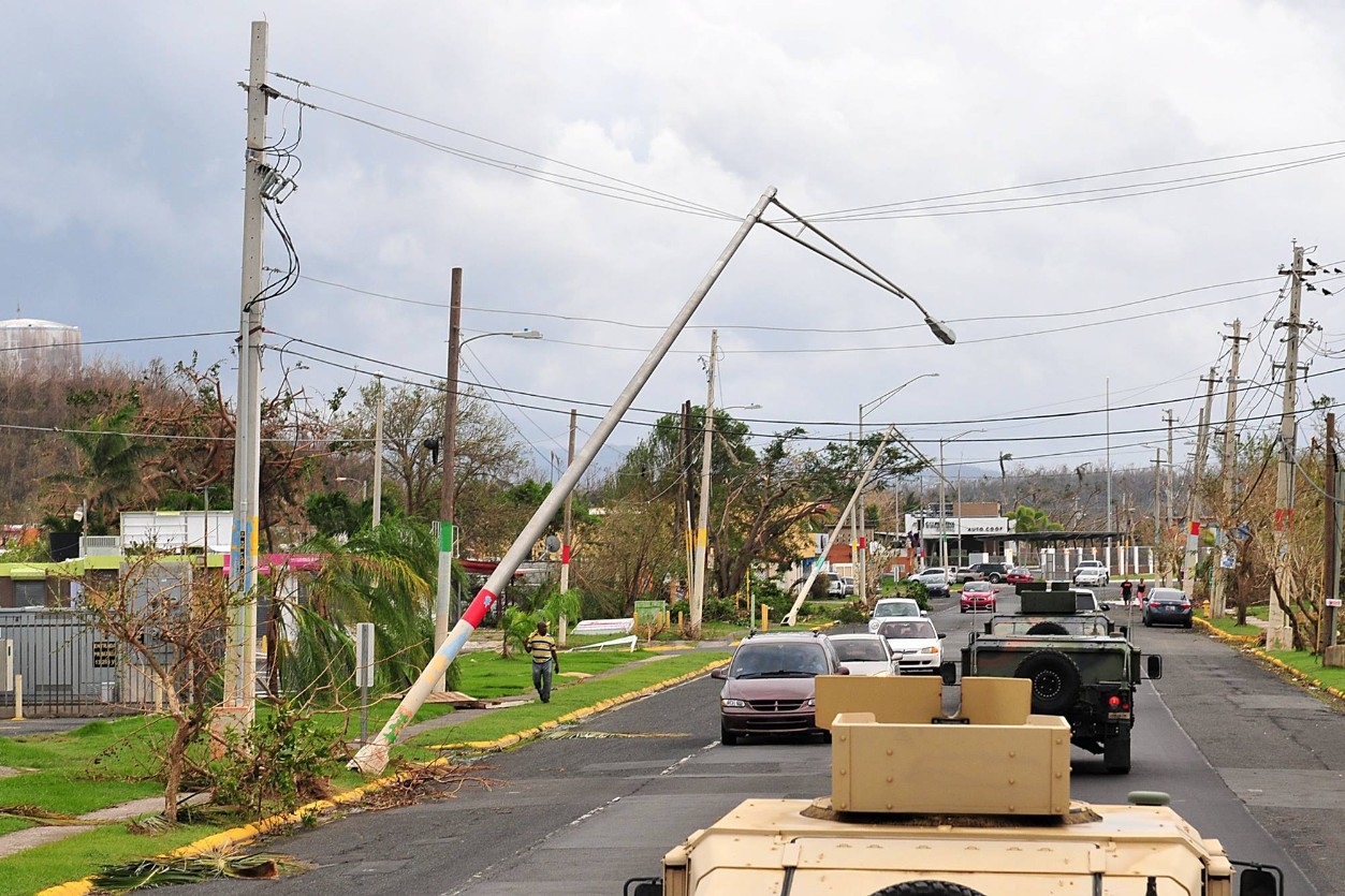 The Puerto Rico National Guard surveys storm damage in Villa Santo after Hurricane Maria. (PNG/Wikimedia Commons)