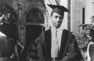 An old photograph of an African-American UC graduate in his cap and gown