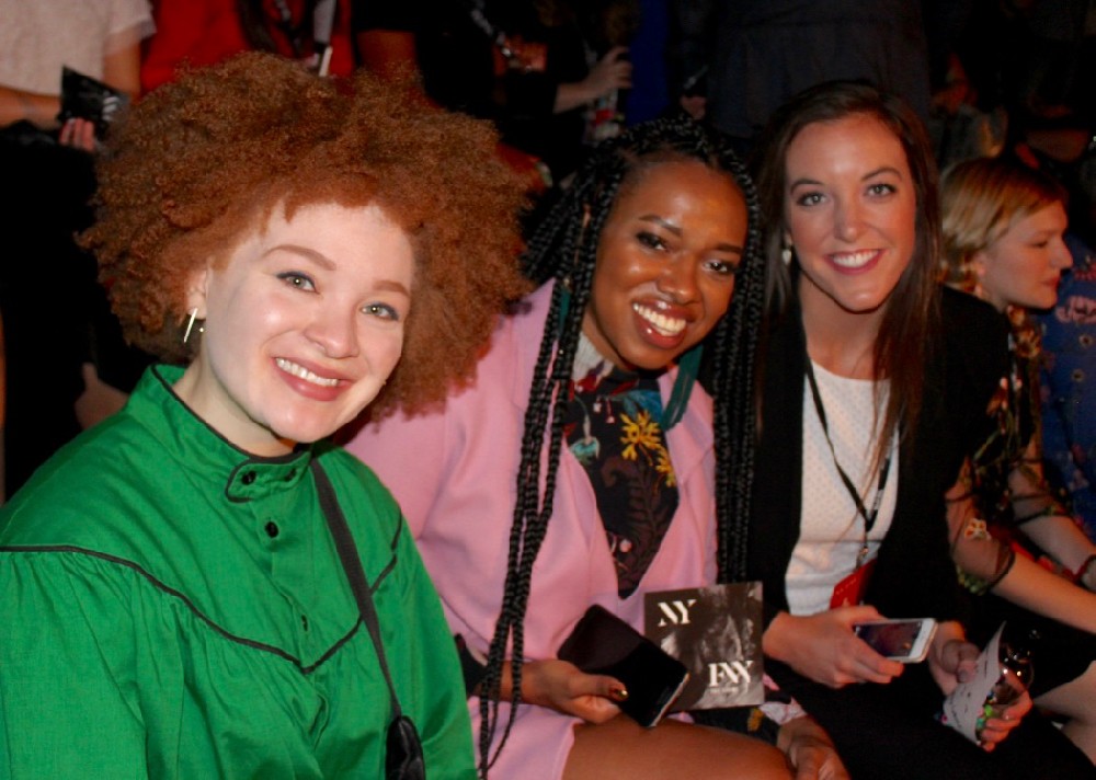 UC DAAP student Julia Bond, Alumna Asha Alma and Meredith Kussmaul smile at a NY fashion show.