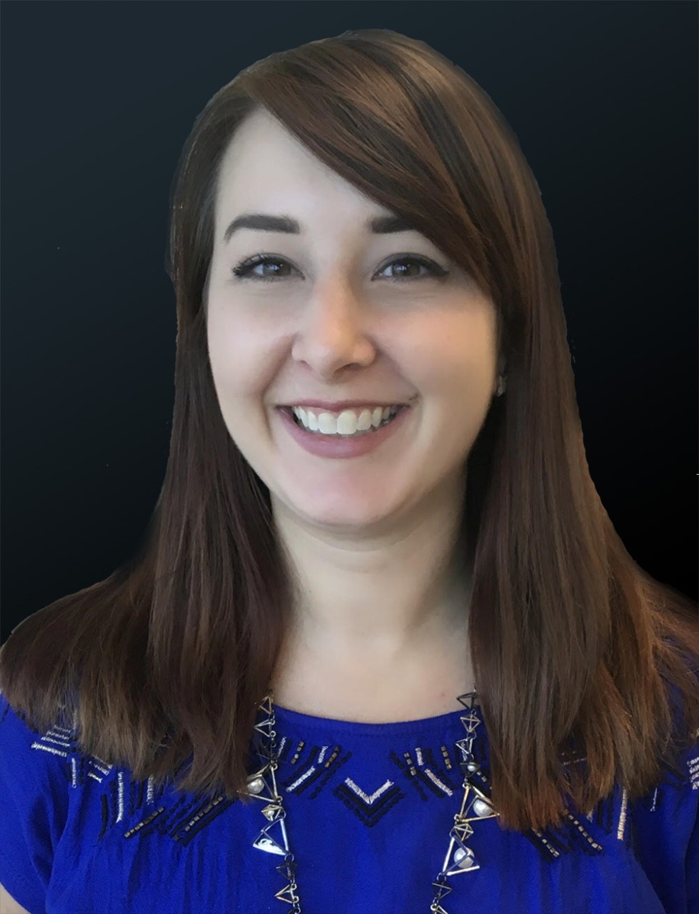 Courtney Osborn smiles in a headshot wearing a blue top and silver necklace