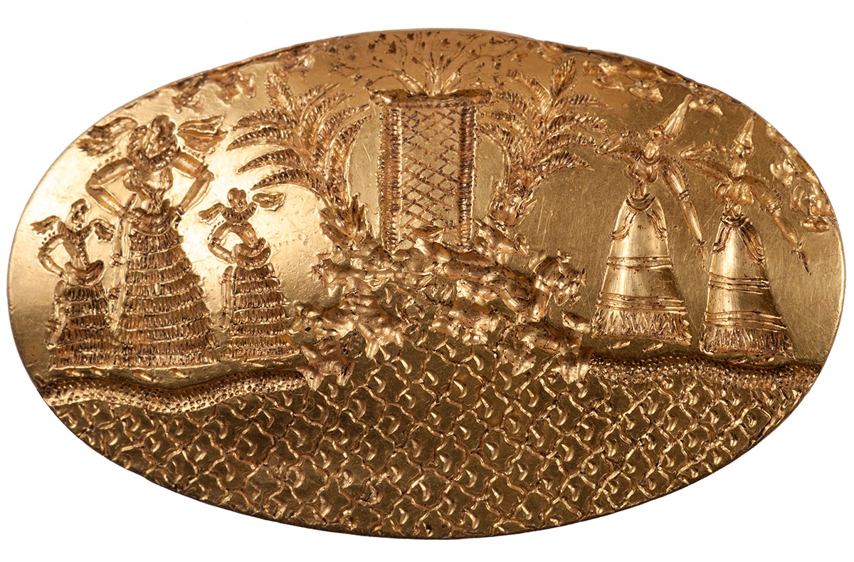 The excavation yielded the discovery of the second largest gold signet ring known in the Aegean world, which shows five elaborately dressed female figures gathered by a seaside shrine. 