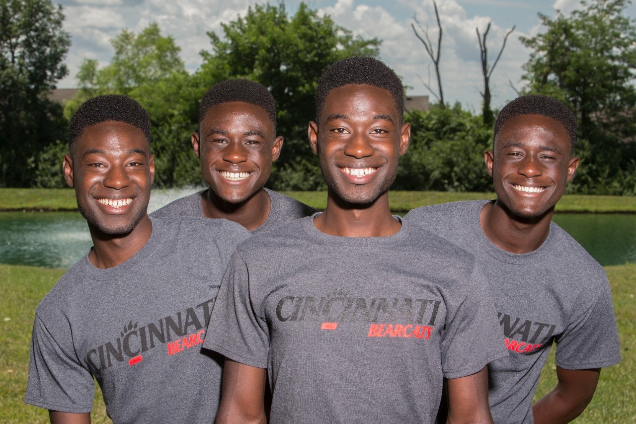UC's double set of identical twins from same family, the four Mantey sons, stand together. photo/Joseph Fuqua II/UC Creative Services