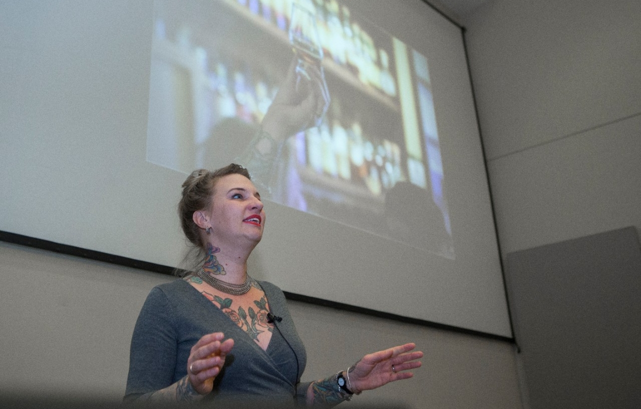 Cincinnati businesswoman and mixologist Molly Wellmann gives a lecture on the origins and medical uses of alcohol to a class of UC medical botany students.