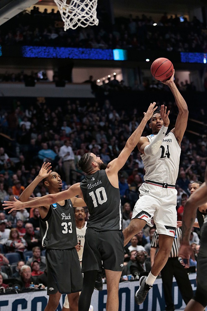 Kyle Washington puts up a contested shot in the paint.