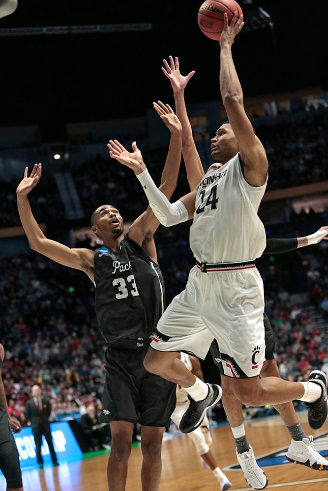 Kyle Washington puts up a contested shot in the paint.