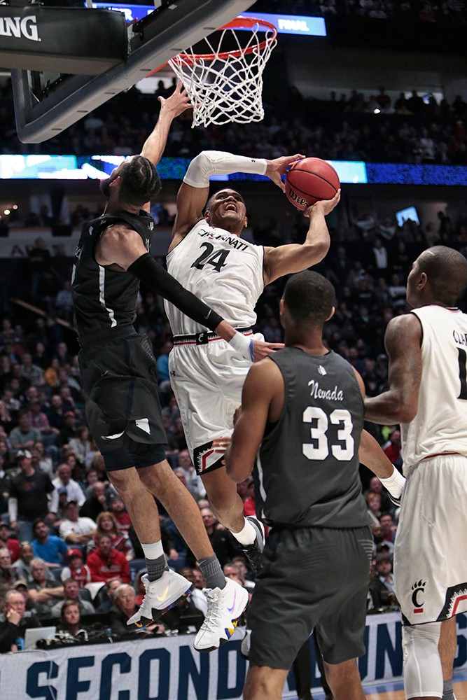 Kyle Washington puts up a contested shot in the paint.