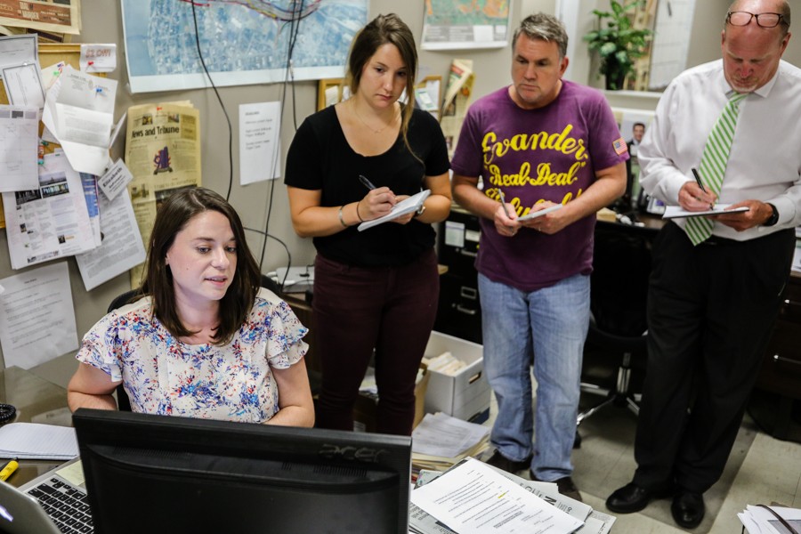 Elizabeth DePompei trains coworkers at the News and Tribune