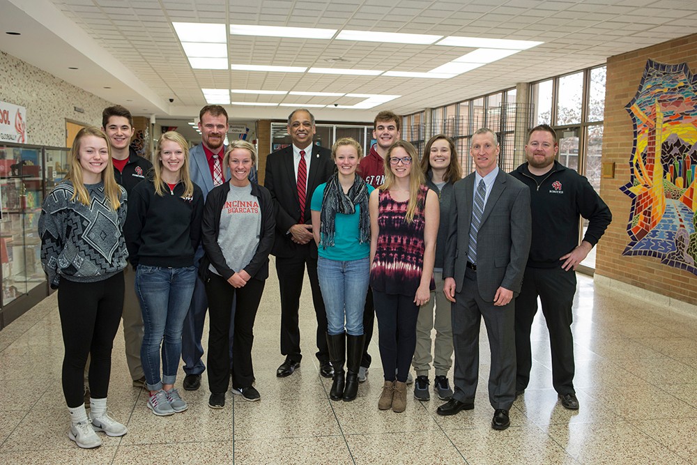 UC President Neville Pinto with high school students