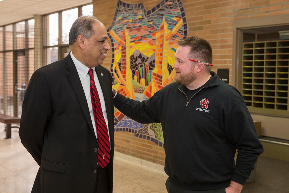 UC President Neville Pinto reconnects with his former student, Dan Boles. The 2003 UC graduate says Pinto was his favorite professor.