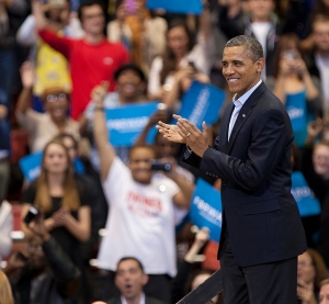 Obama clapping with the crowd at the Nov. 2012 rally