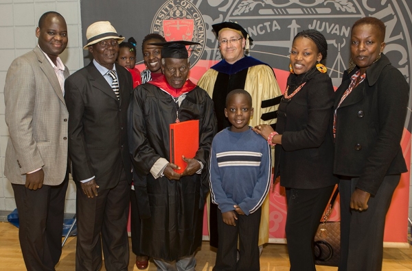 Samuel Ochiel Obura and his family attended UC's doctoral and master's commencement ceremony on May 1, 2015.
