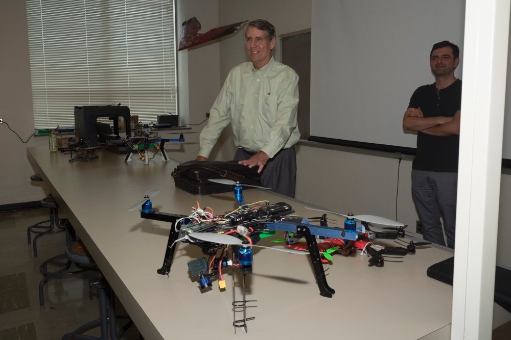 Larry Bennett, UC fire science explains the importance of FAA approval for flying drones to representatives from ODOT.