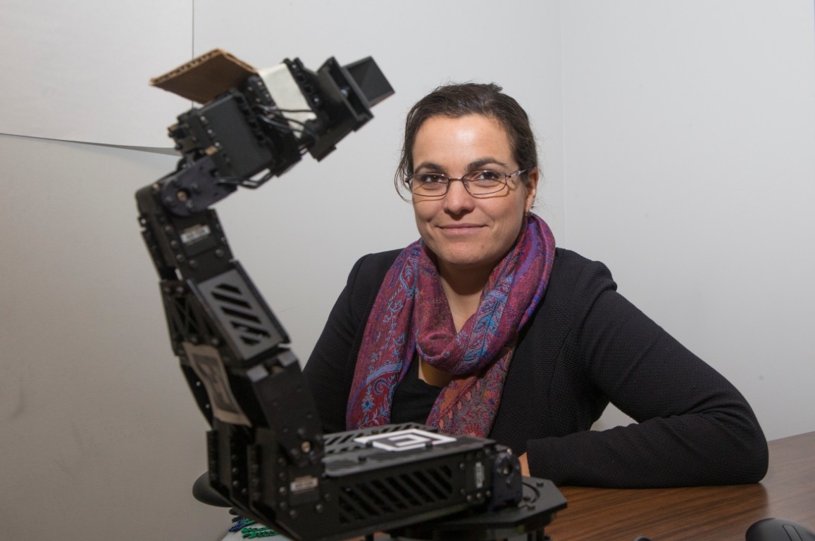 UC assistant professor Tamara Lorenz, who holds a joint appointment in psychology and mechanical and electrical engineering, is studying the interactions between humans and robots in her lab.