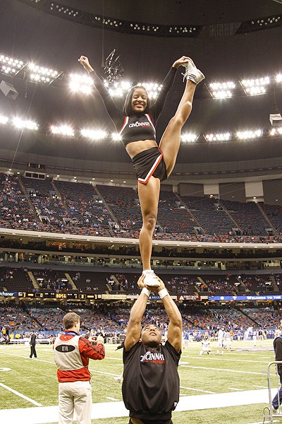 UC cheerleaders perform during the game.