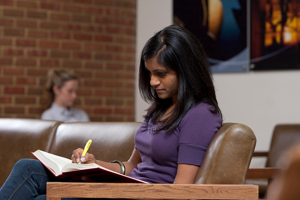 UC student highlights a textbook