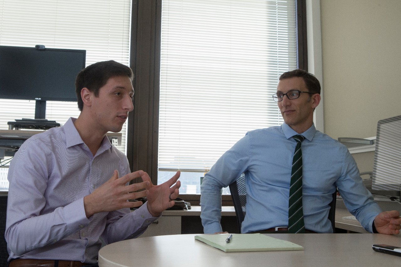 UC engineering student Andrew Jajack, left, and UC engineering professor Jason Heikenfeld talk about their critical review of the biosensor industry, which appeared in the nanotechnology journal Lab on a Chip.