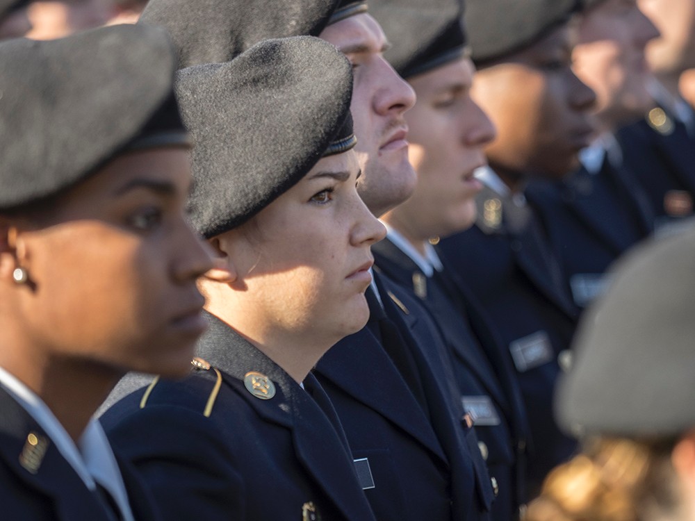 Soldiers stand at attention in salute of the nation's veterans.