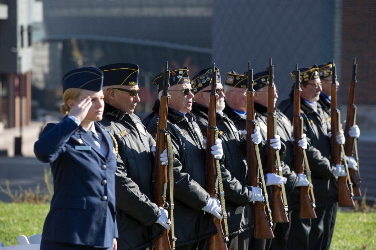 The American Legion Post 530 Honor Guard stands ready to fire a volley during the 21-gun salute.