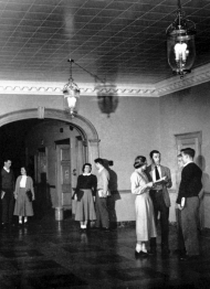 Students standing inside McMicken Hall's 1st floor in 1950.