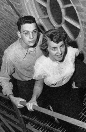 Sophomore Jean Michel and her friend climb the stairs of the tower in the newly refurbished McMicken Hall in 1950