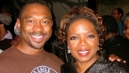 White with Oprah Winfrey after a Color Purple show.