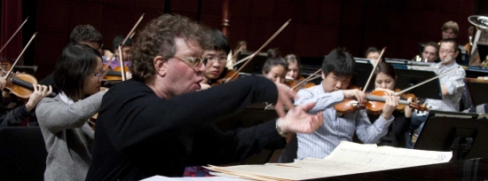 Randy Edelman conducting CCM students at a rehearsal for Sunday's concert.