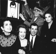 Carol Channing shows off Reams' caricature in Sardi's restaurant. With him are Ann Miller, Ethel Merman and Carole Cook.  