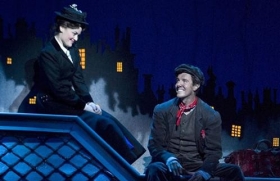 Mary Poppins sits on a rooftop with Bert.