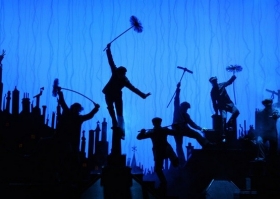 The chimney-sweep dance number with actor silhouettes against a blue background.