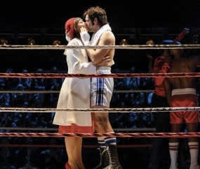 Adrian and Rocky kiss in the ring.